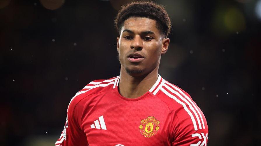 Marcus Rashford playing for Manchester United