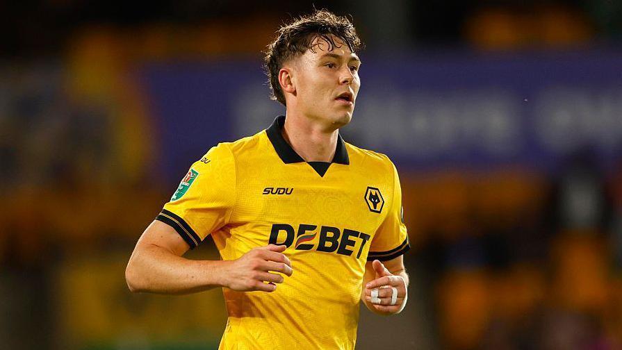 Jorgen Strand Larsen in a Wolves kit