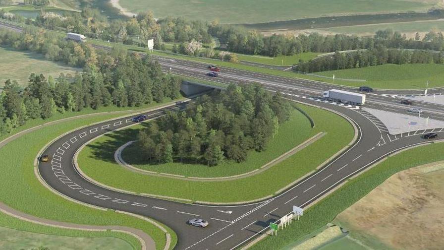 The illustration shows a new stretch of dual carriage way with lorries and cars on it.
There is also a large roundabout-type road feature and slip roads.