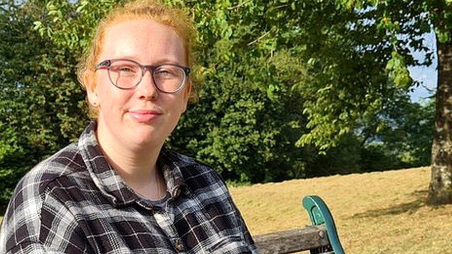 Sarah Wynne sitting on a bench