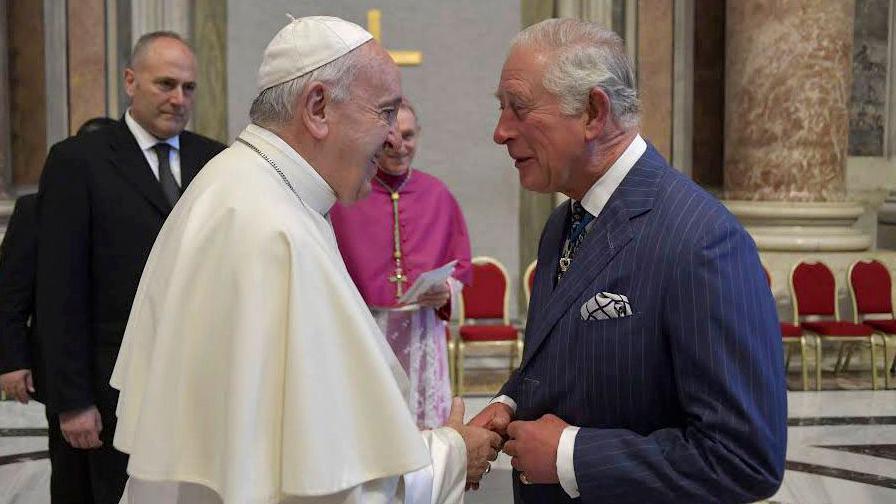 Pope Francis and King Charles meeting at the Vatican in 2019