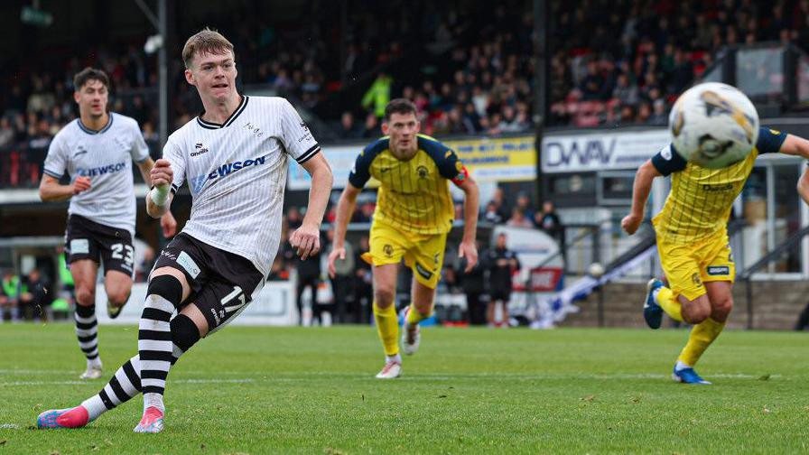 Ayr's Jay Henderson turns home his penalty against Morton