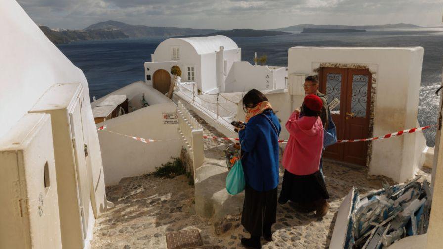  Residents and tourists leave the Greek island of Santorini as fears of an impending earthquake rise following a series of tremors in Santorini