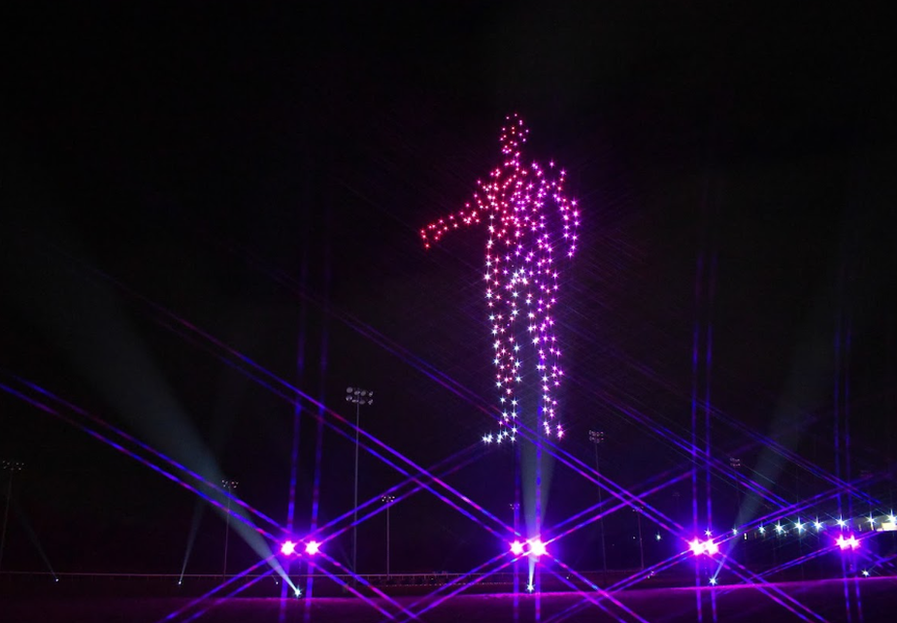 A drone light display of a person