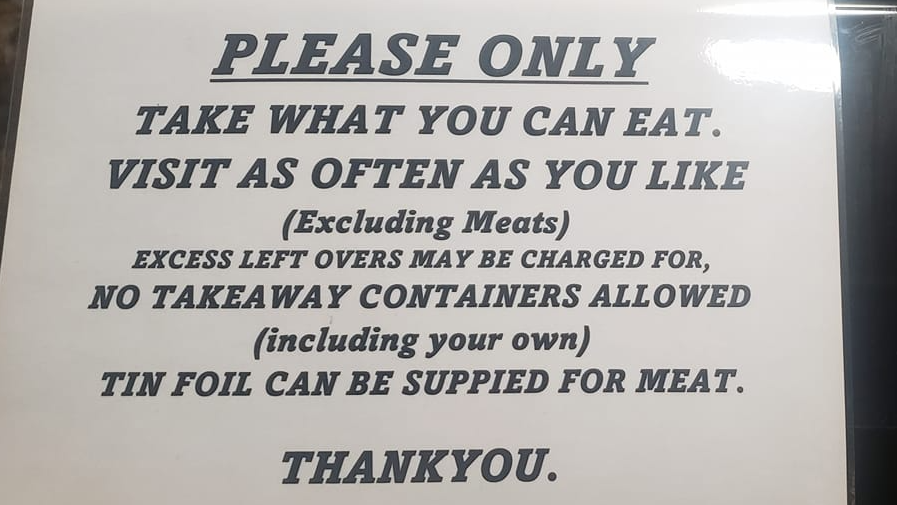 Sign at The Star Inn at Vogue in St Day. It says: "Please only take what you can eat. Visit as often as you like (excluding meats). Excess left overs may be charged for, no takeaway containers allowed (including your own) tin foil can be supplied for meat. Thank you."