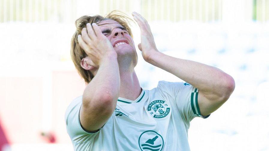 Hibernian's Nathan Lowe looks dejected after missing a big chance during a UEFA Conference League Second Qualifying Round First Leg match between KF Malisheva and Hibernian at Fadil Vokrri Stadium, on July 23, 2026 in Pristina, Kosovo.