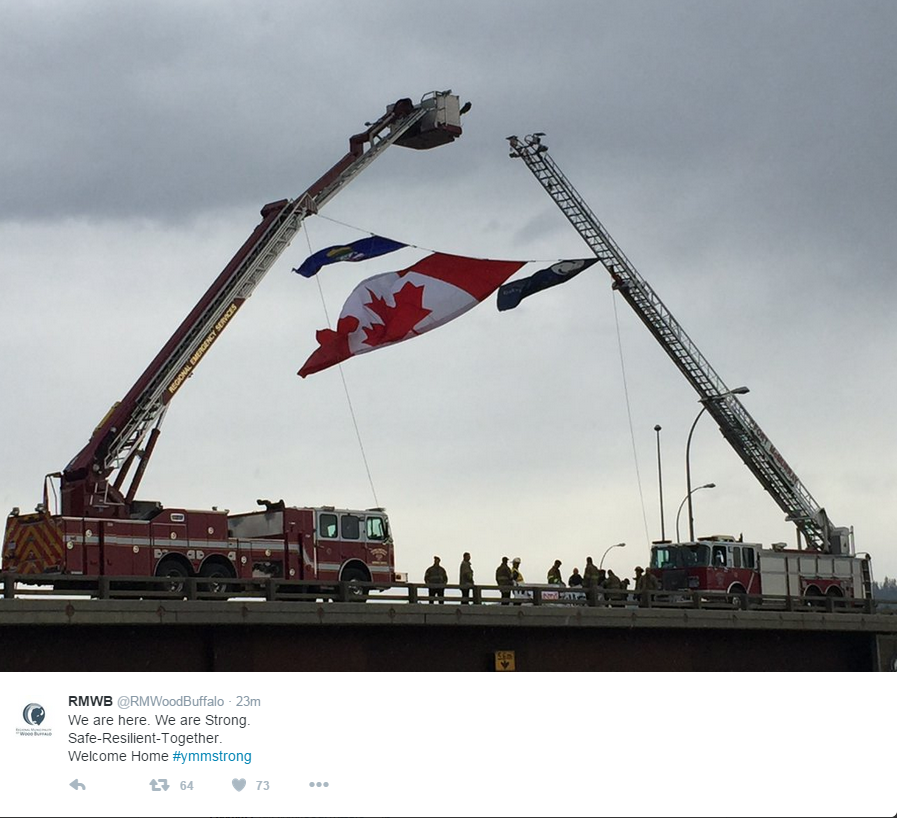 Tweet from Regional Municipality of Wood Buffalo saying "We are here. We are strong. Safe-resilient-together. Welcome home.