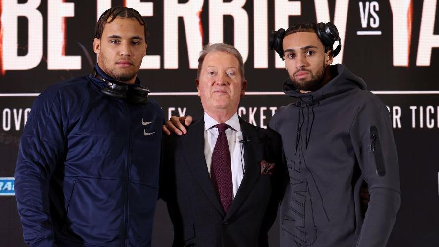 Frank Warren posing with Moses Itauma and Karol Itauma in January 2023