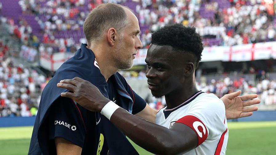 Thomas Tuchel hugs Bukayo Saka after England's friendly win over Costa Rica in June 2026