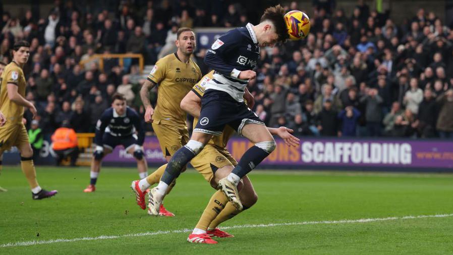 Luke Cundle heads in his first goal for Millwall