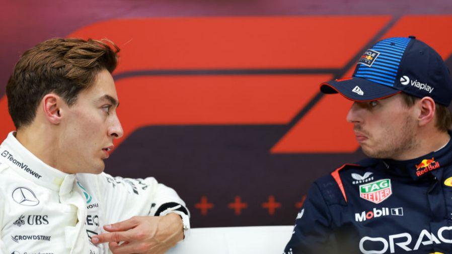 George Russell talks to Max Verstappen at the Dutch Grand Prix in 2024.