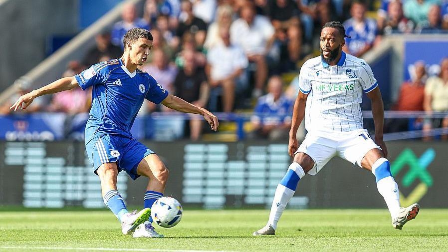 Bilal El Khannouss plays a pass under pressure from Sheffield Wednesday midfielder Nathaniel Chalobah