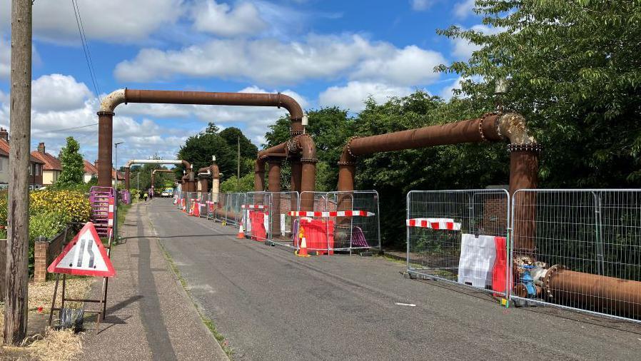 Above ground pipes on Blue Boar Lane