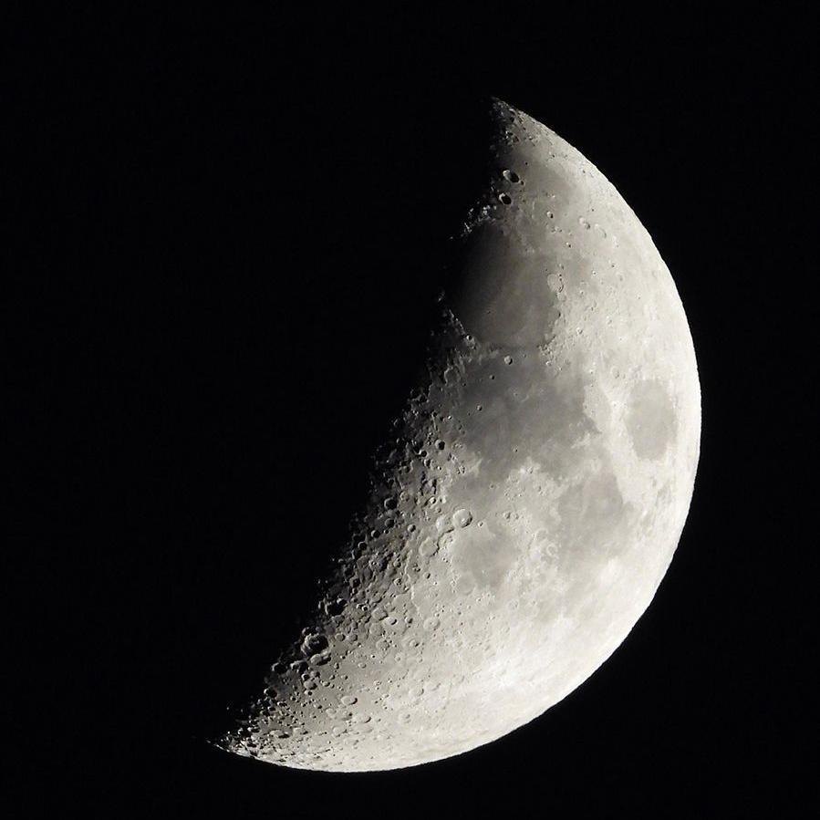 Close up of the Moon over Netherton. Half of it is illuminated with the other half in total darkness