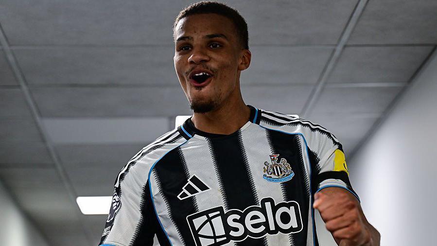 Malick Thiaw celebrates after Newcastle United's win against Nottingham Forest