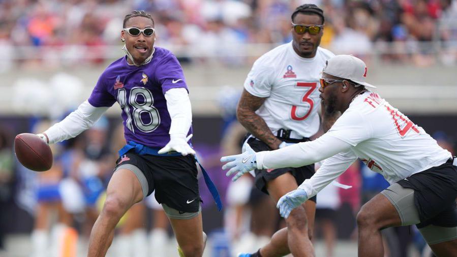 Justin Jefferson running with the ball during a flag football game at the NFL Pro Bowl Games in 2025