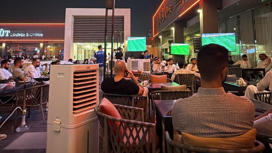 Fans at a cafe in Riyadh
