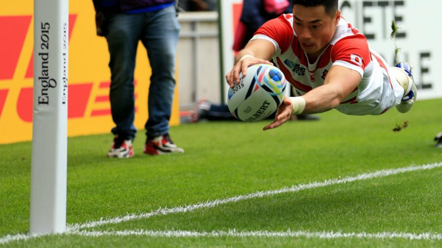 Japan's Akihito Yamada scores a try