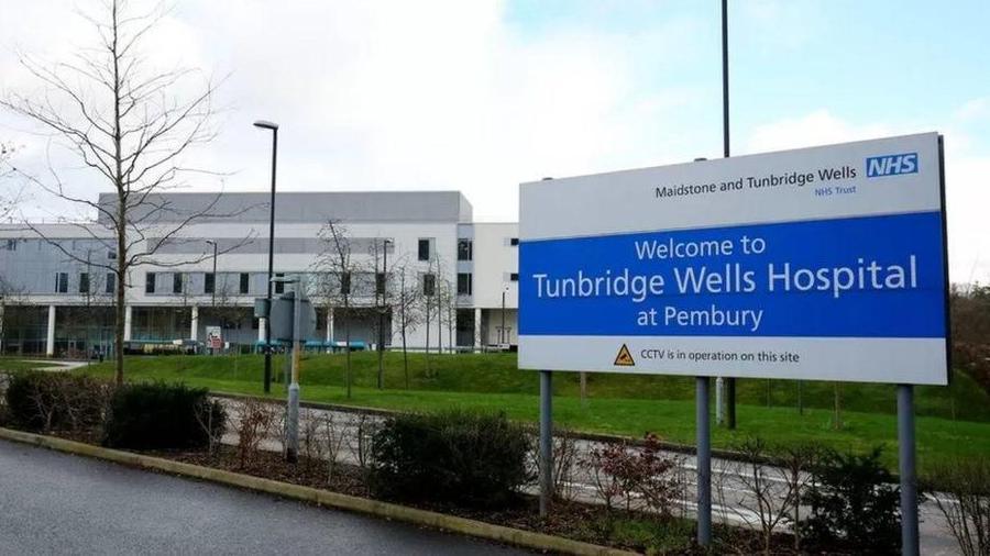 A sign outside a hospital.