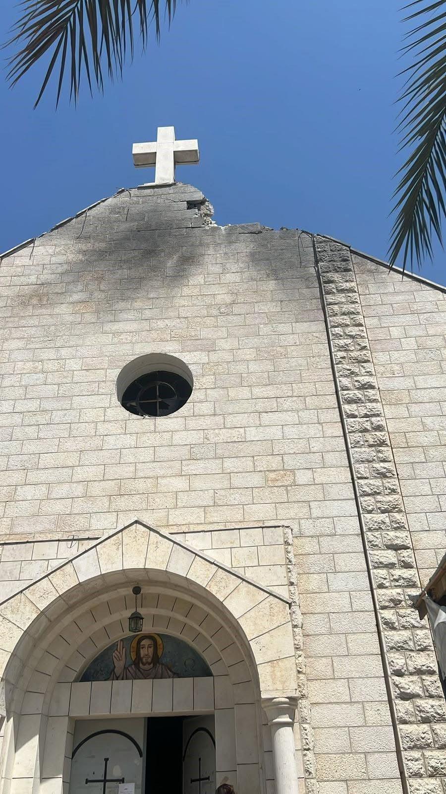 Damaged cross and roof of the Holy Family Church in Gaza City, Gaza (17 July 2025)
