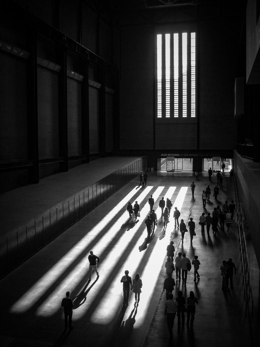 Sun streams through a large window illuminating the floor 