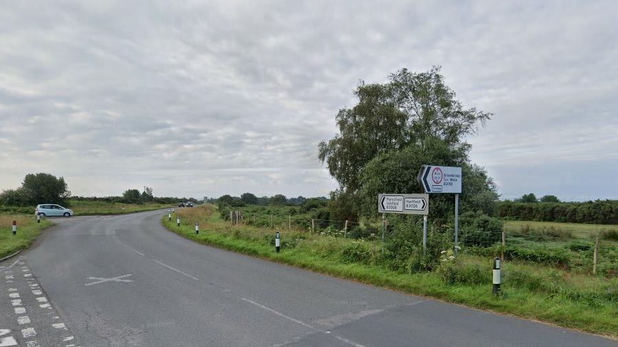 A junction on the B2026 near the entrance to the King’s Standing car park