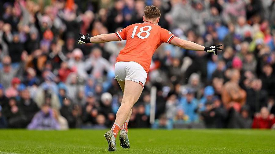 Oisin O'Neill celebrates scoring a goal