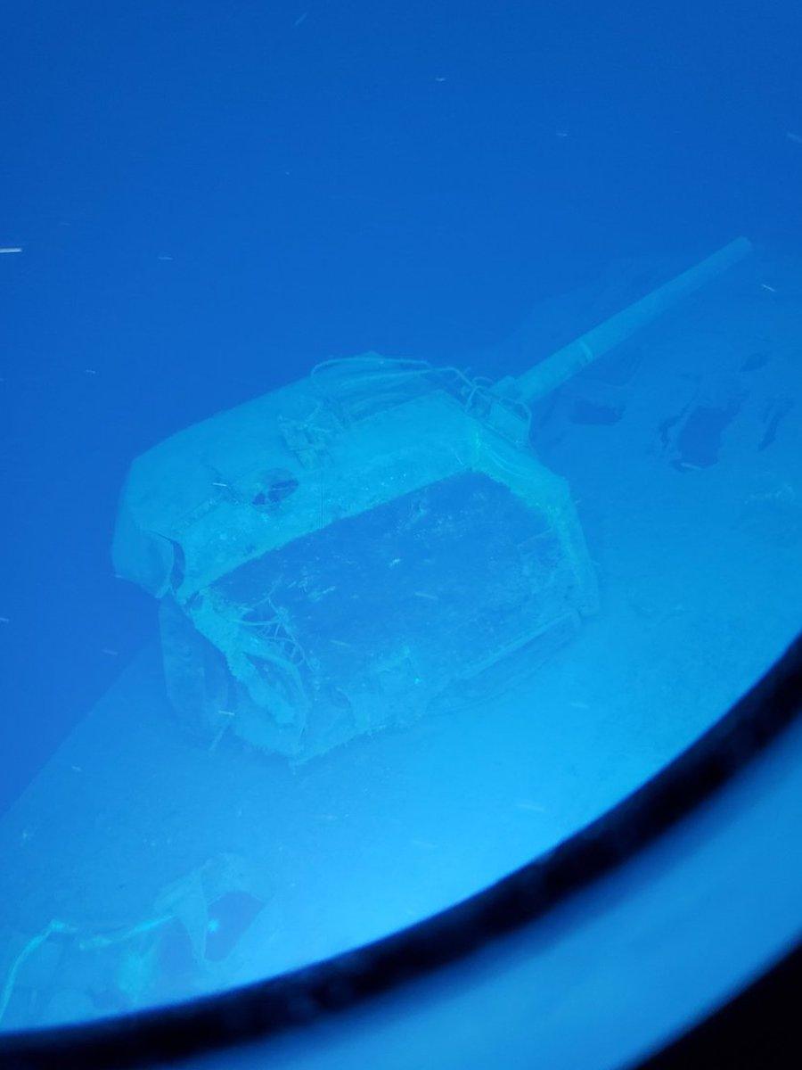 A gun turret can still be seen on the sunken ship