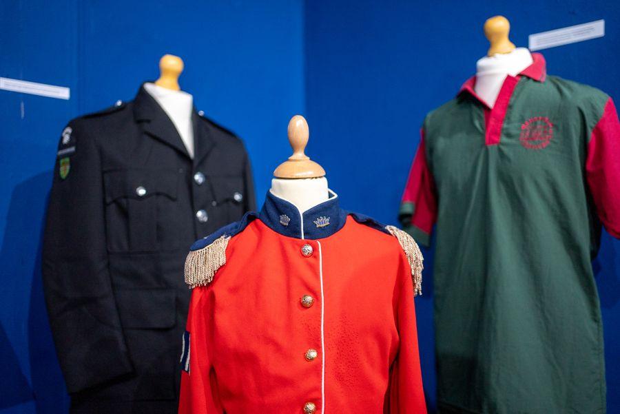 St John Ambulance jacket from 1970, the polo shirt worn by Mansfield District Council’s Leisure and Community Services in 2000, and a jacket worn by a member of the Mansfield Coronets junior marching jazz band in 1974.