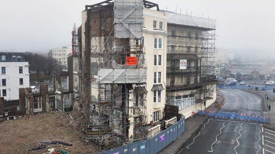 A hotel with scaffolding.