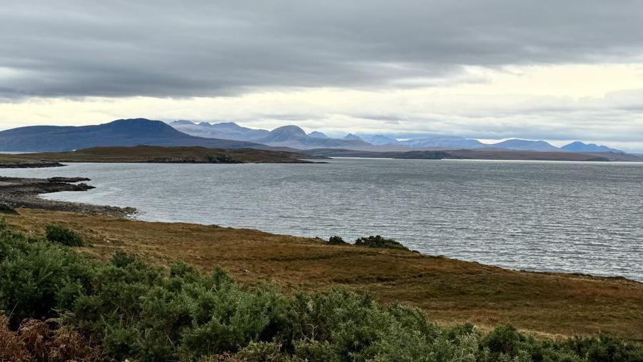 A Highland landscape of hills, mountains and sea. The view is from Achiltibuie.