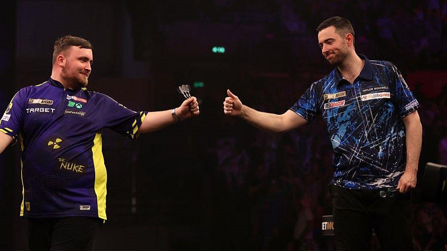 Luke Littler and Luke Humphries fist bump