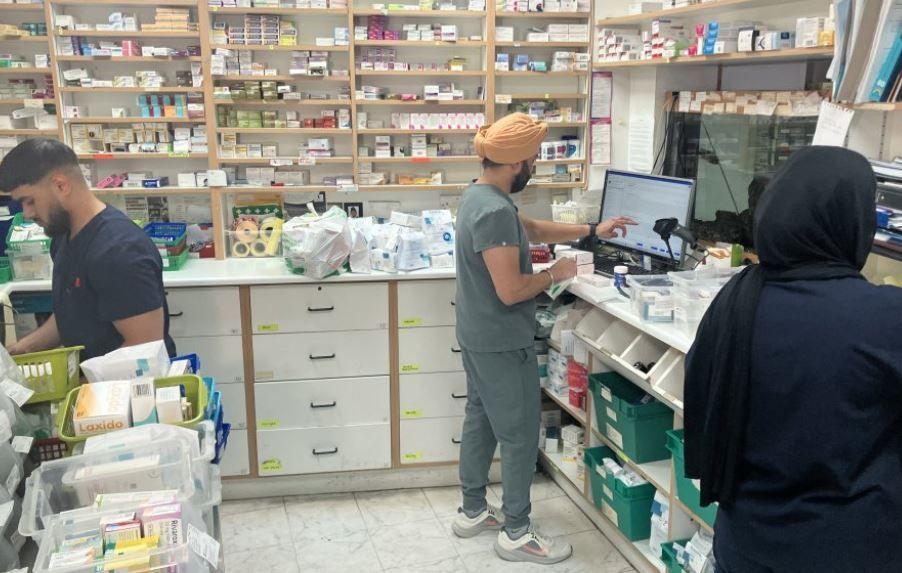 Pharmacists inside a chemist