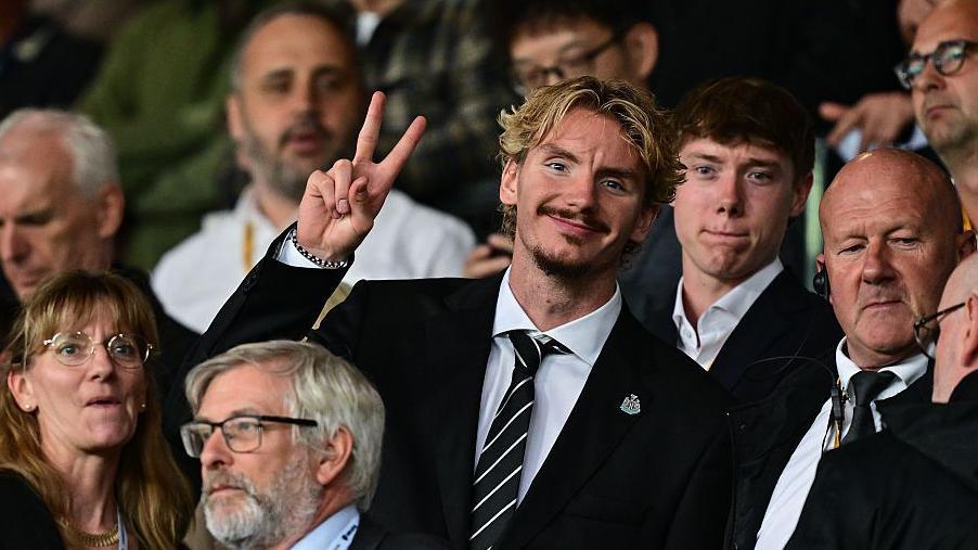 Nick Woltemade watches on during Newcastle United's game against Leeds United at Elland Road