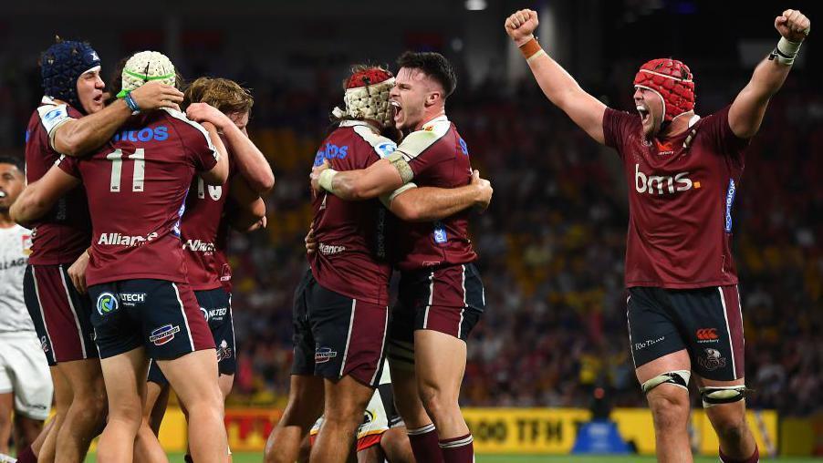 Queensland Reds players celebrating