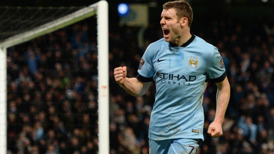 James Milner celebrates scoring his team's first goal during the FA Cup third-round tie between Manchester City and Sheffield Wednesday at Etihad Stadium in 2015