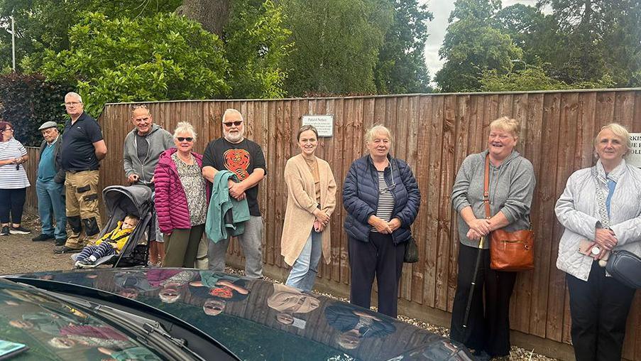 Queue of people outside the dental practice