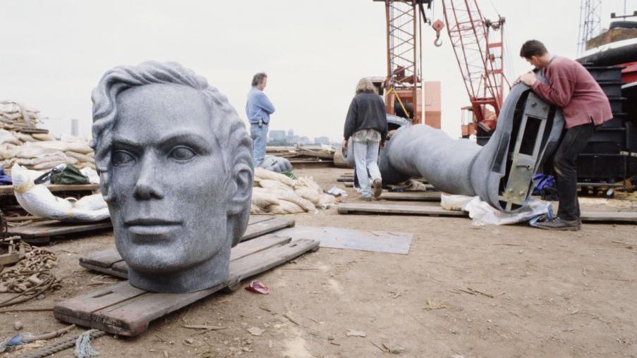 Michael Jackson statue being assembled on the bakes of the River Thames for the History launch in June 1995