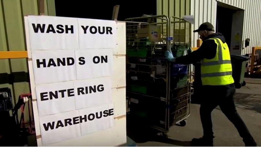 FareShare worker entering warehouse