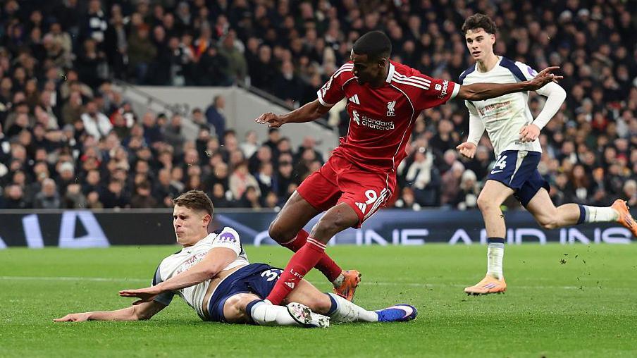 Tottenham defender Micky van de Ven tackles Liverpool's Alexander Isak as the Swede scores at Tottenham Hotspur Stadium