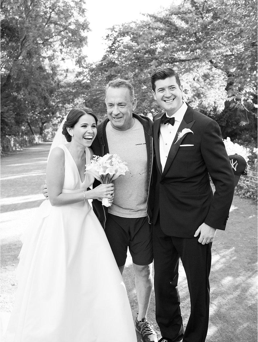 The couple laugh with Tom Hanks