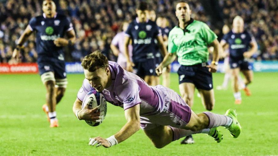 Jamie Dobie scores Scotland's fourth try against USA