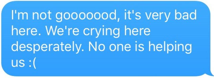 Text message saying: I'm not gooooood, it's very bad here. We're crying here desperately. No one is helping us :(