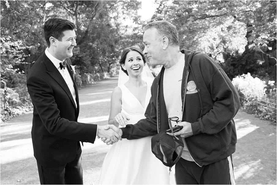 Tom Hanks shakes the groom's hand