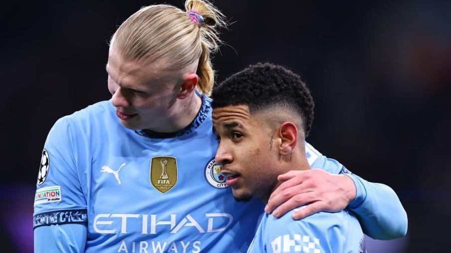 Erling Haaland congratulates Savinho after his goal helped  Manchester City to victory over Club Brugge in the Champions League