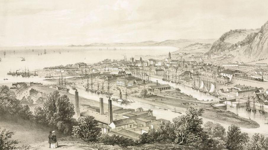 Tinted lithograph by Newman & Co, London, showing a view of the port of Swansea in south Wales. 