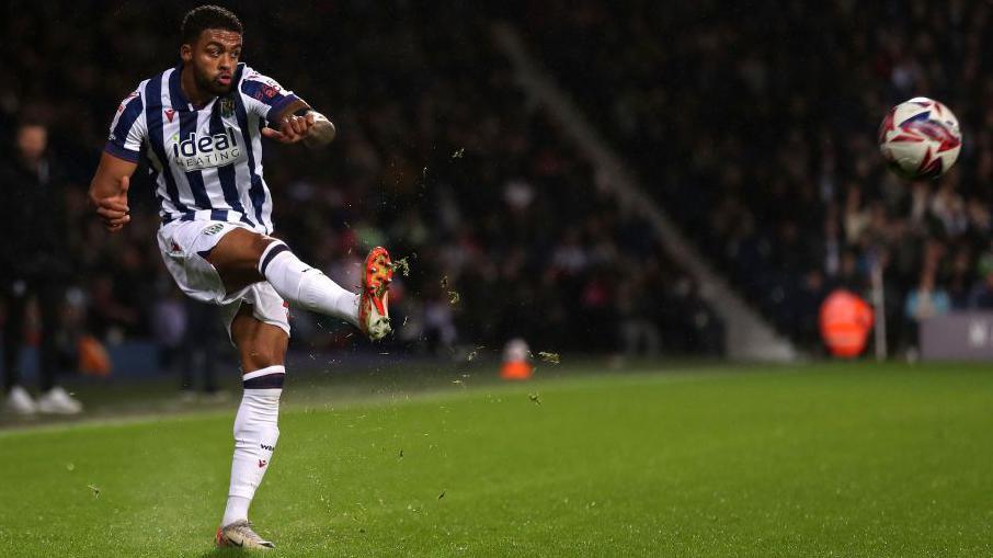 Darnell Furlong crosses the ball during a match for West Bromwich Albion 