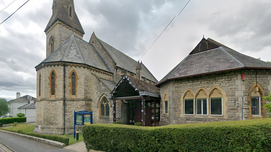 Outside view of Christ Church, Christchurch Road, Winchester. It is a large, pale stone church.