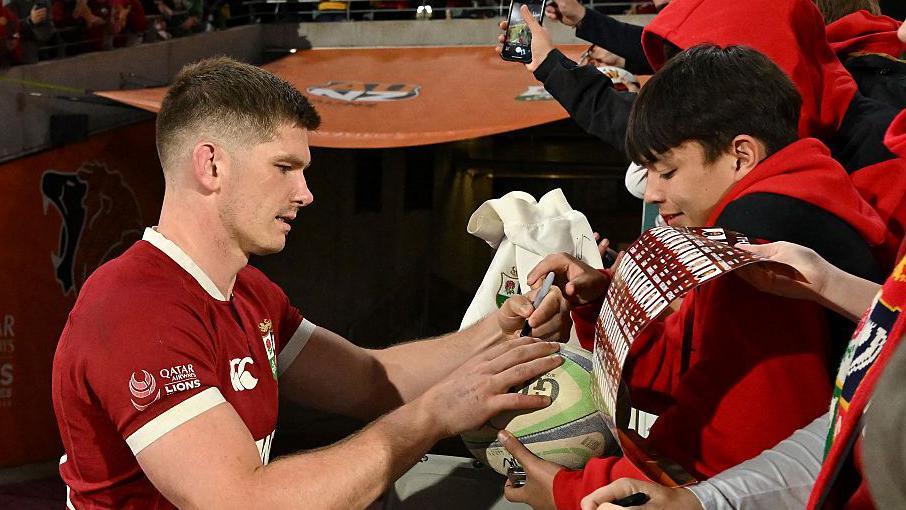 Owen Farrell gives autographs to fans after the tour match against the Australia and New Zealand Invitational XV at Adelaide Oval