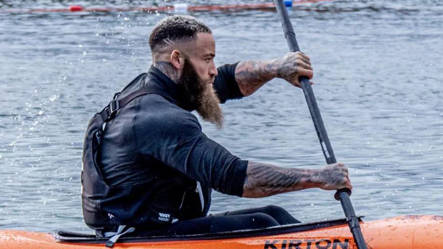 Ashley Cain kayaking